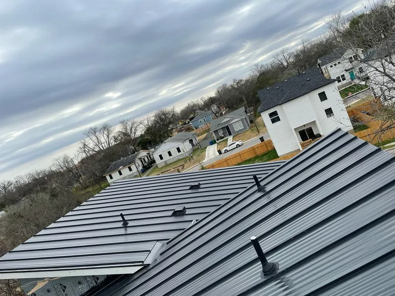 Standing seam metal roof panels with vents for Skylight Repair in Guymon